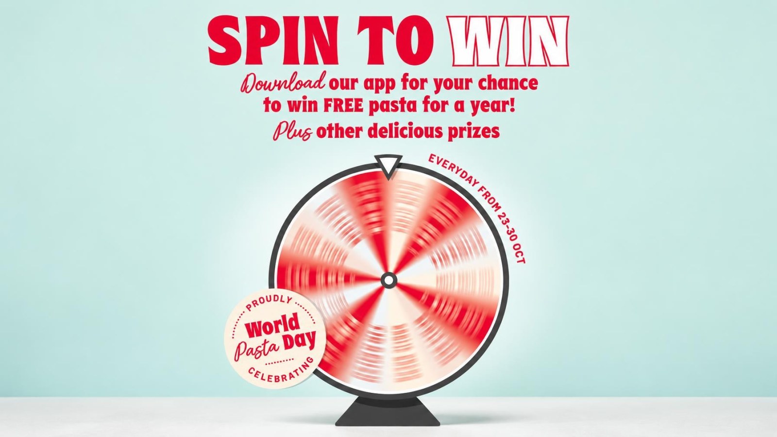 Vapiano Celebrates World Pasta Day with Free Pasta for a Year Giveaway and Daily Prizes 1 Red and white spinning prize wheel against pastel blue wall with text about winning free pasta for a year and other prizes